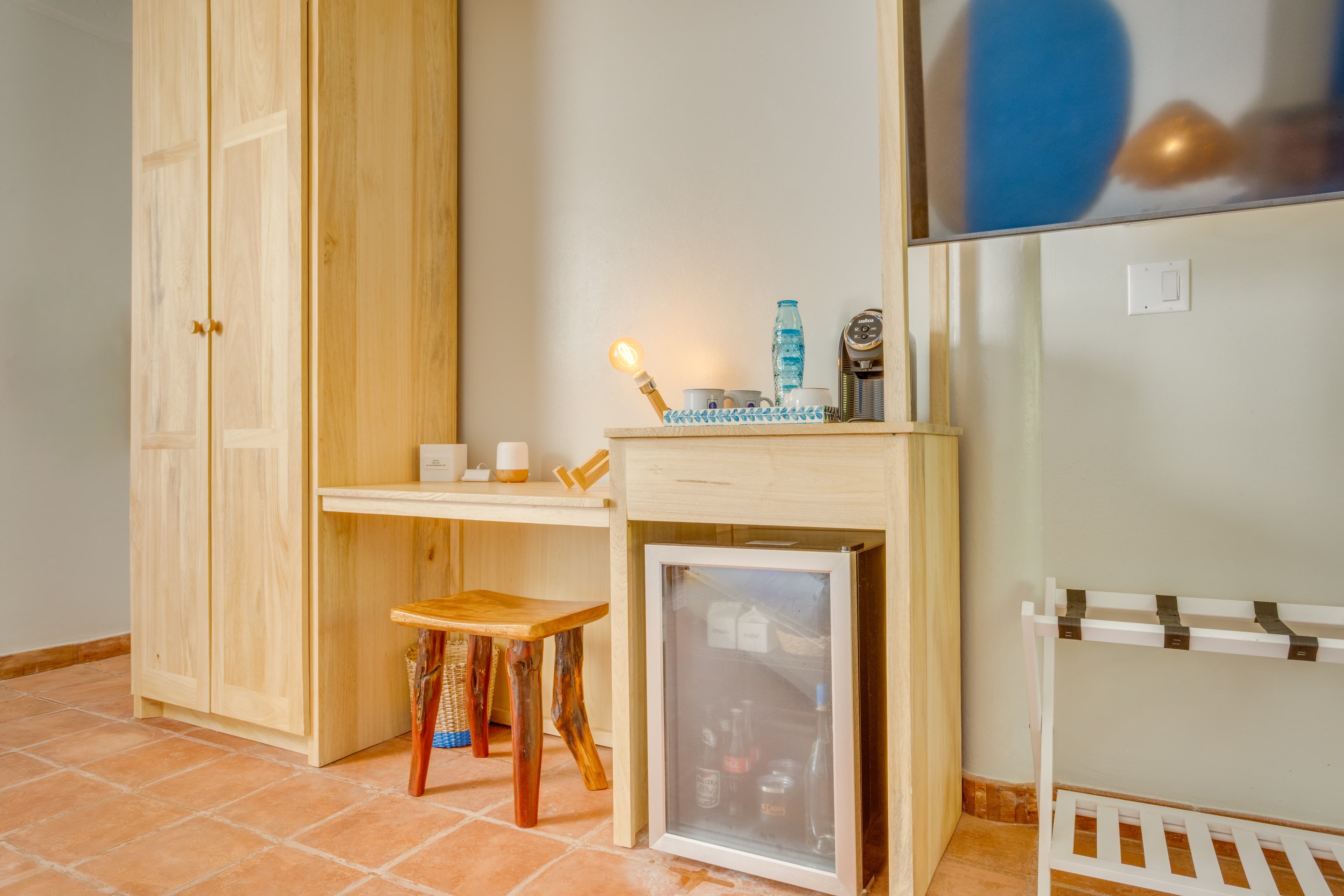 Closet, mini bar and Lavazza coffee maker