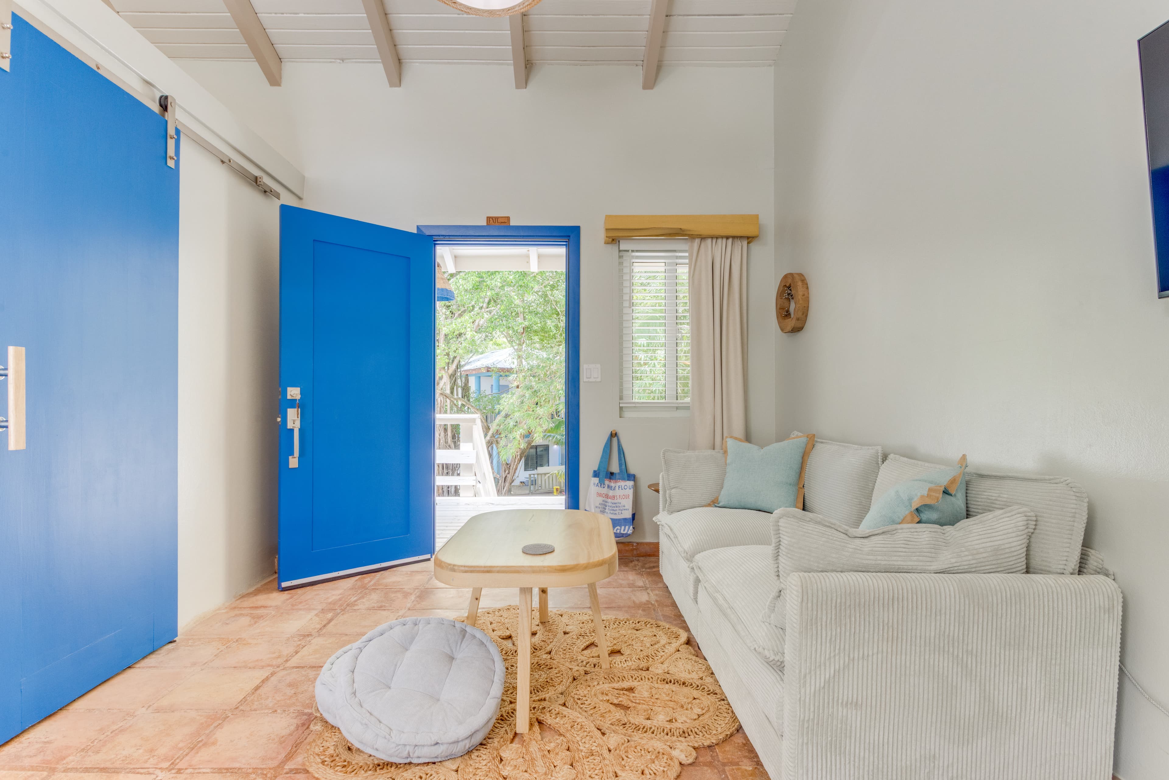 Front door to the suite with sliding door to the spa style bathroom on the left
