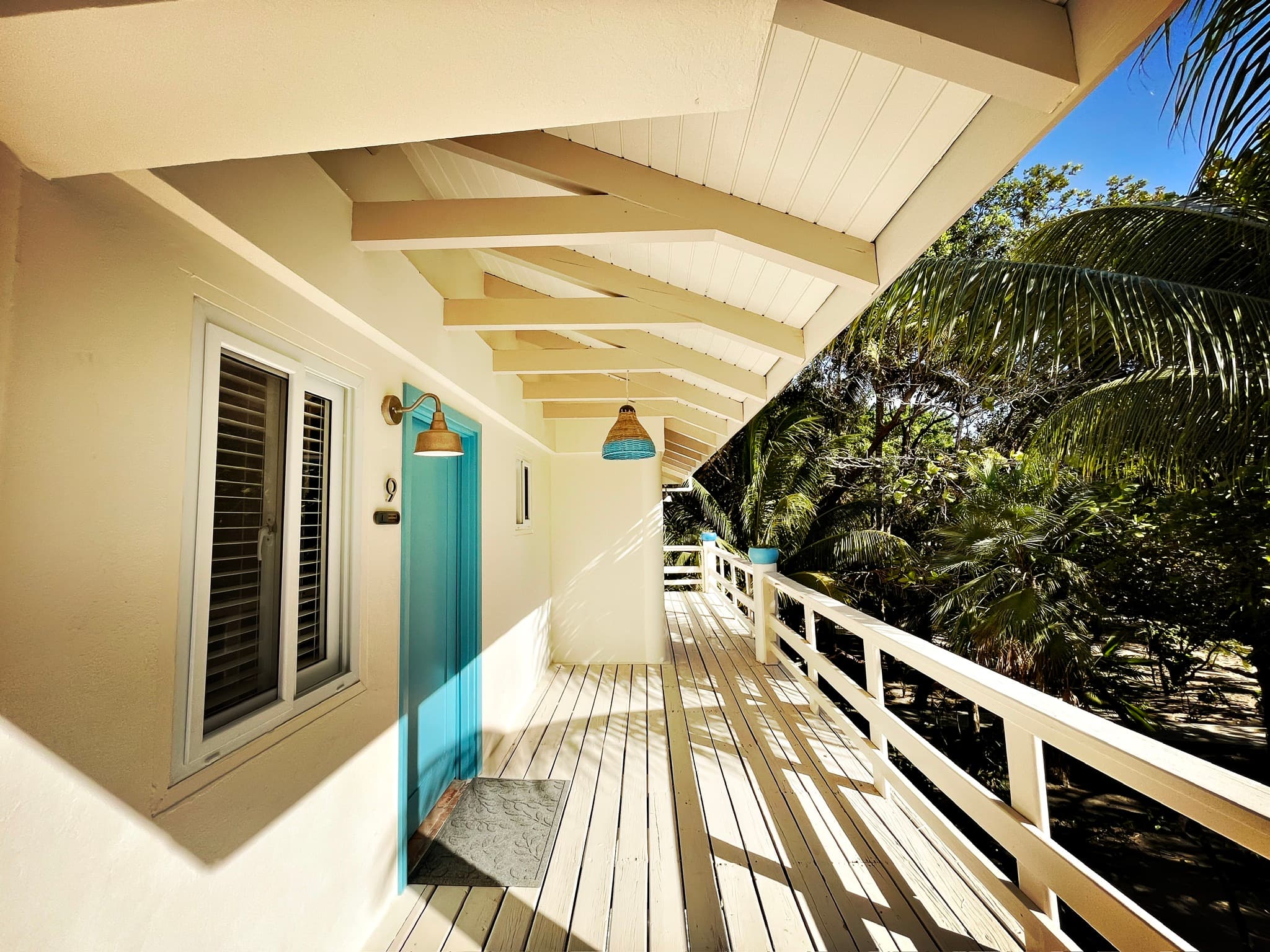 Upper walkway overlooking the gardens and parking lot to the rear