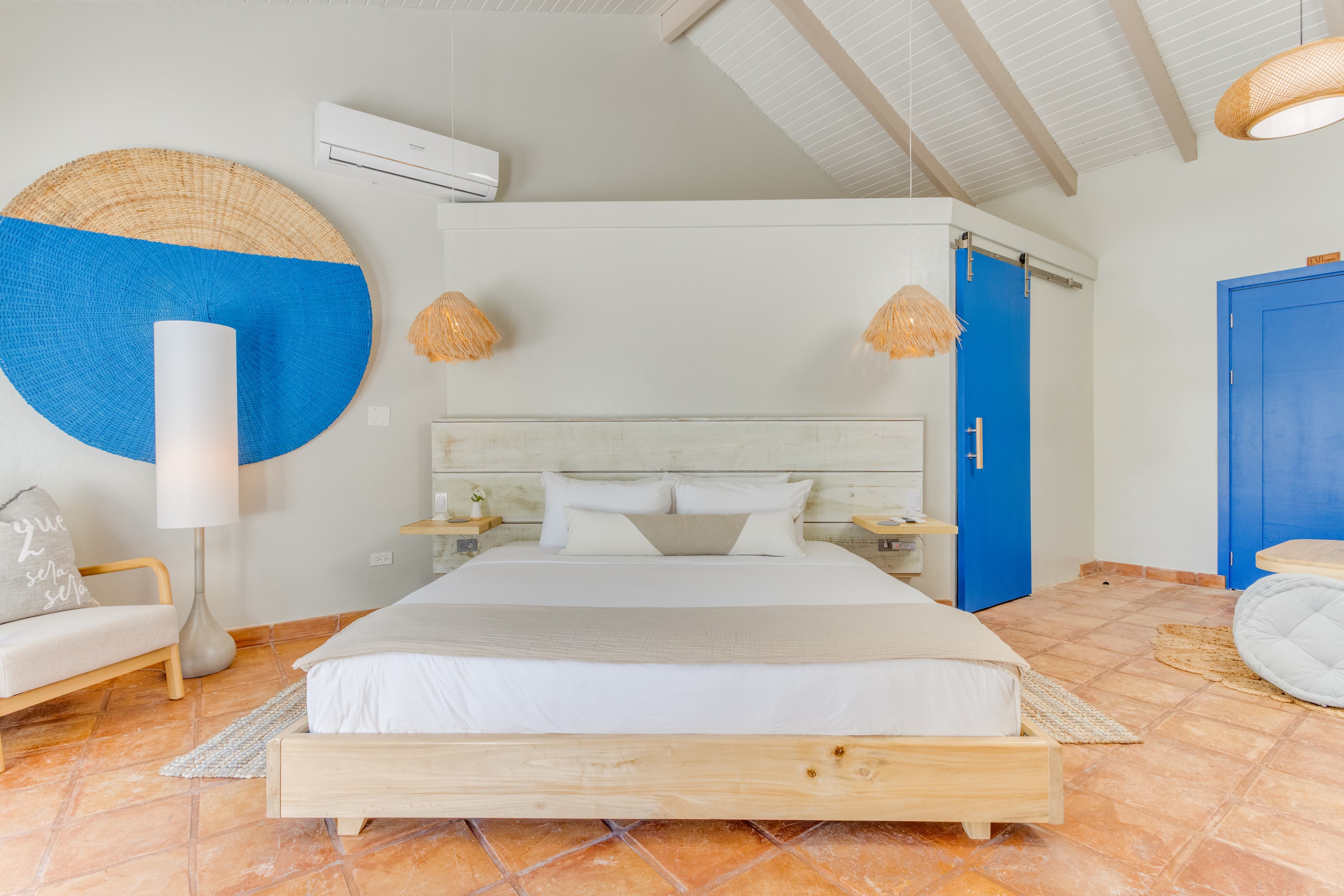 All the comforts of home in rustic beach luxury - premium linens, charging stations and AC