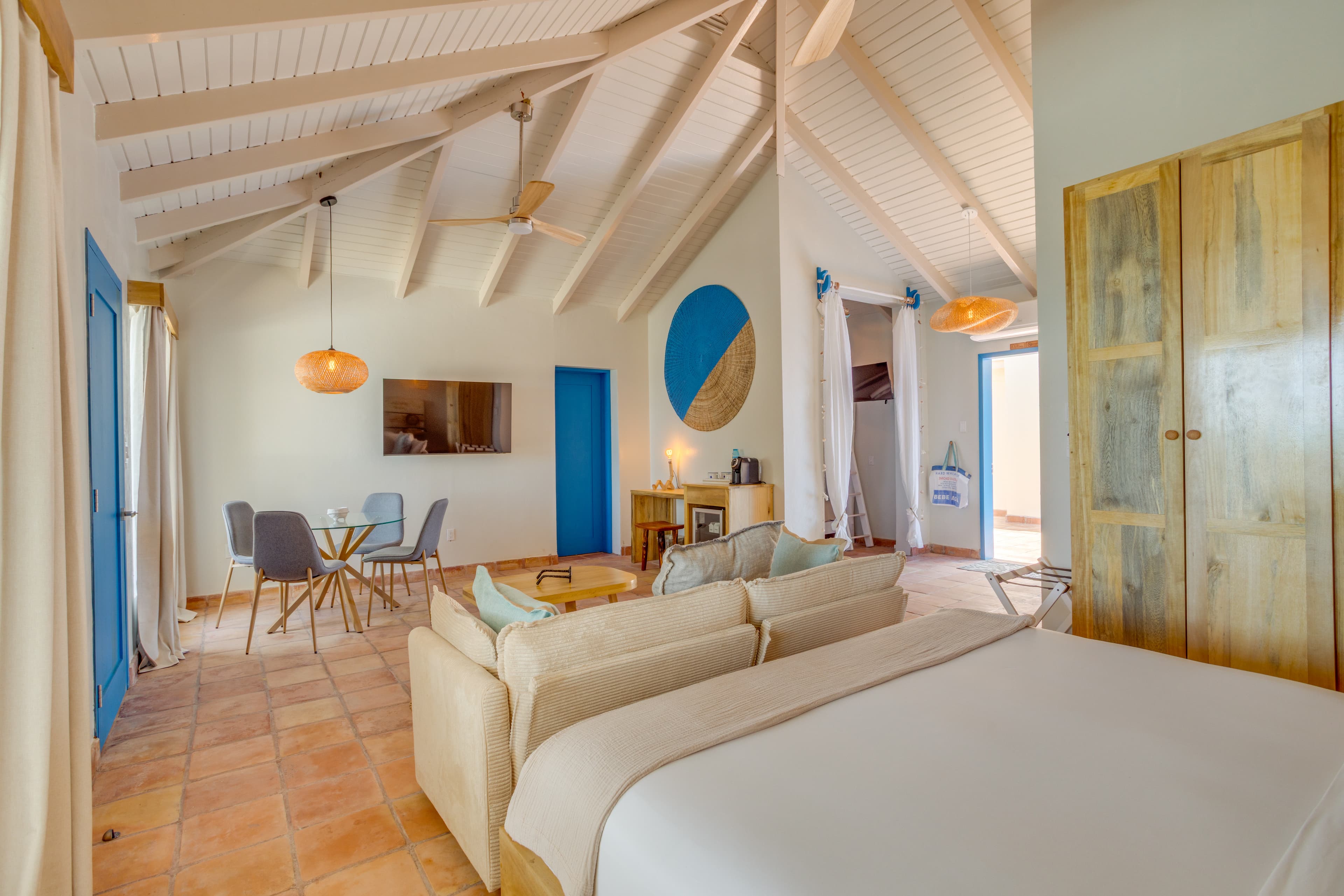 Spacious suite with remote controlled AC and fan and charging stations