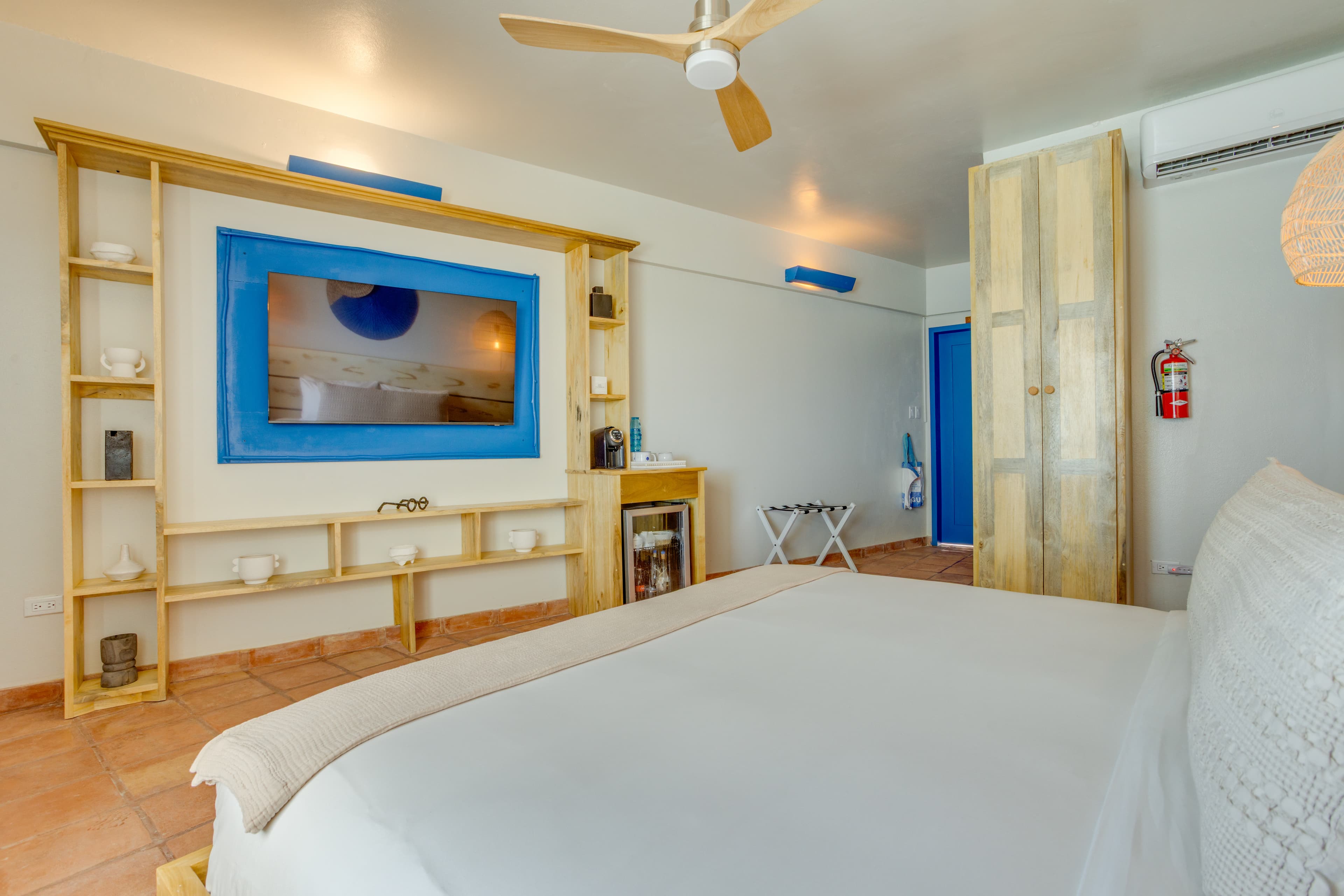 TV with streaming services, coffee maker, mini bar and all the tech of home