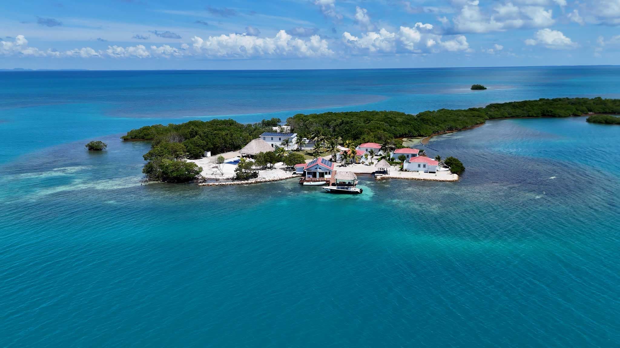 An aerial view of Blue Reef Island and the surrounding cayes that are off the coast of Dangriga