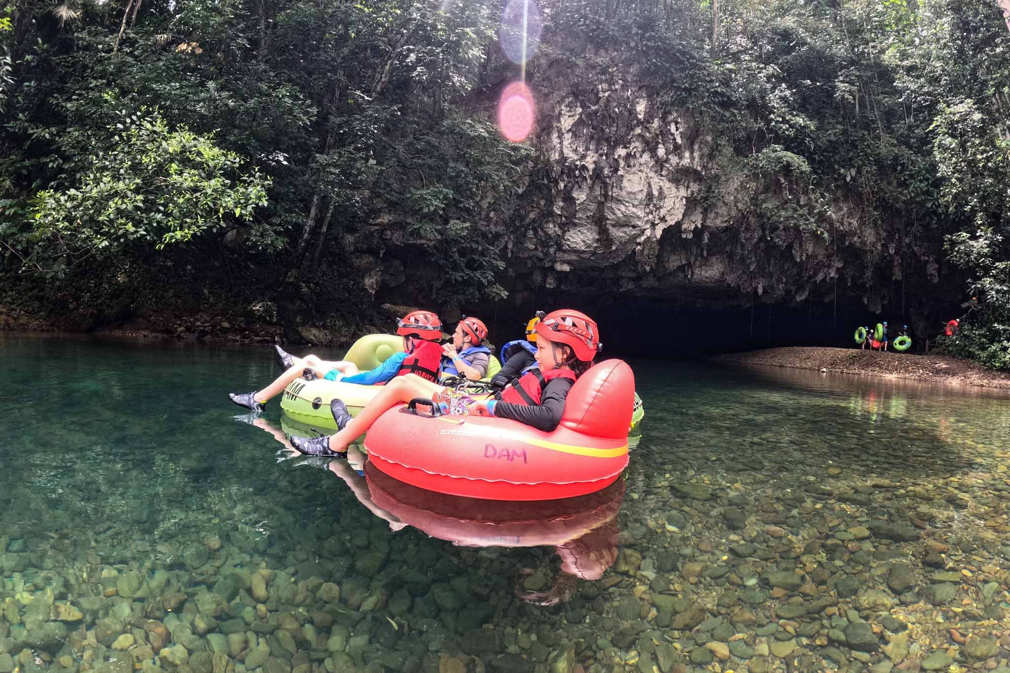 Guest doing river tubing in southern Belize.