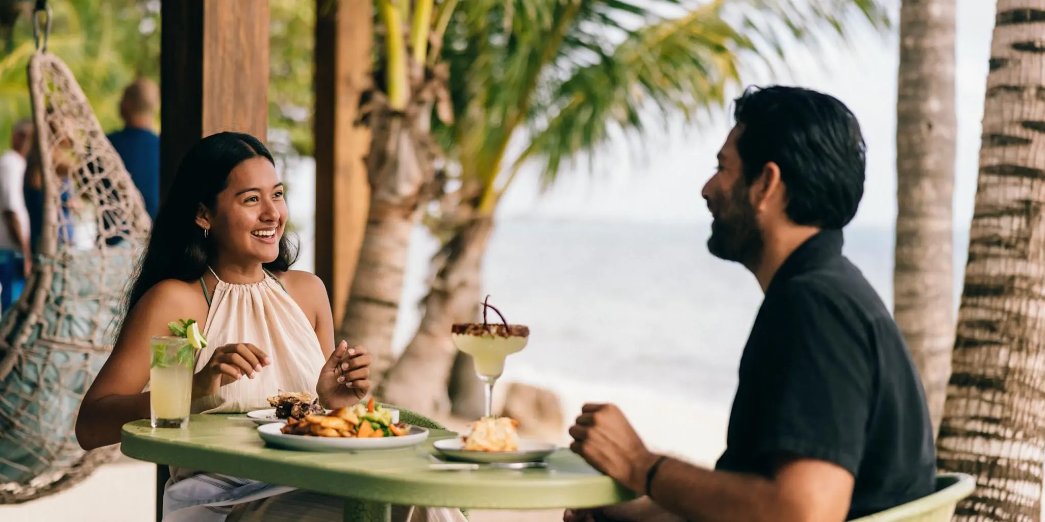 Idyllic romantic alfresco lunch experience for two at Bamboo Beach Bistro, a beachfront dining destination at Blue Reef Beach Resort, Placencia Peninsula, Southern Belize