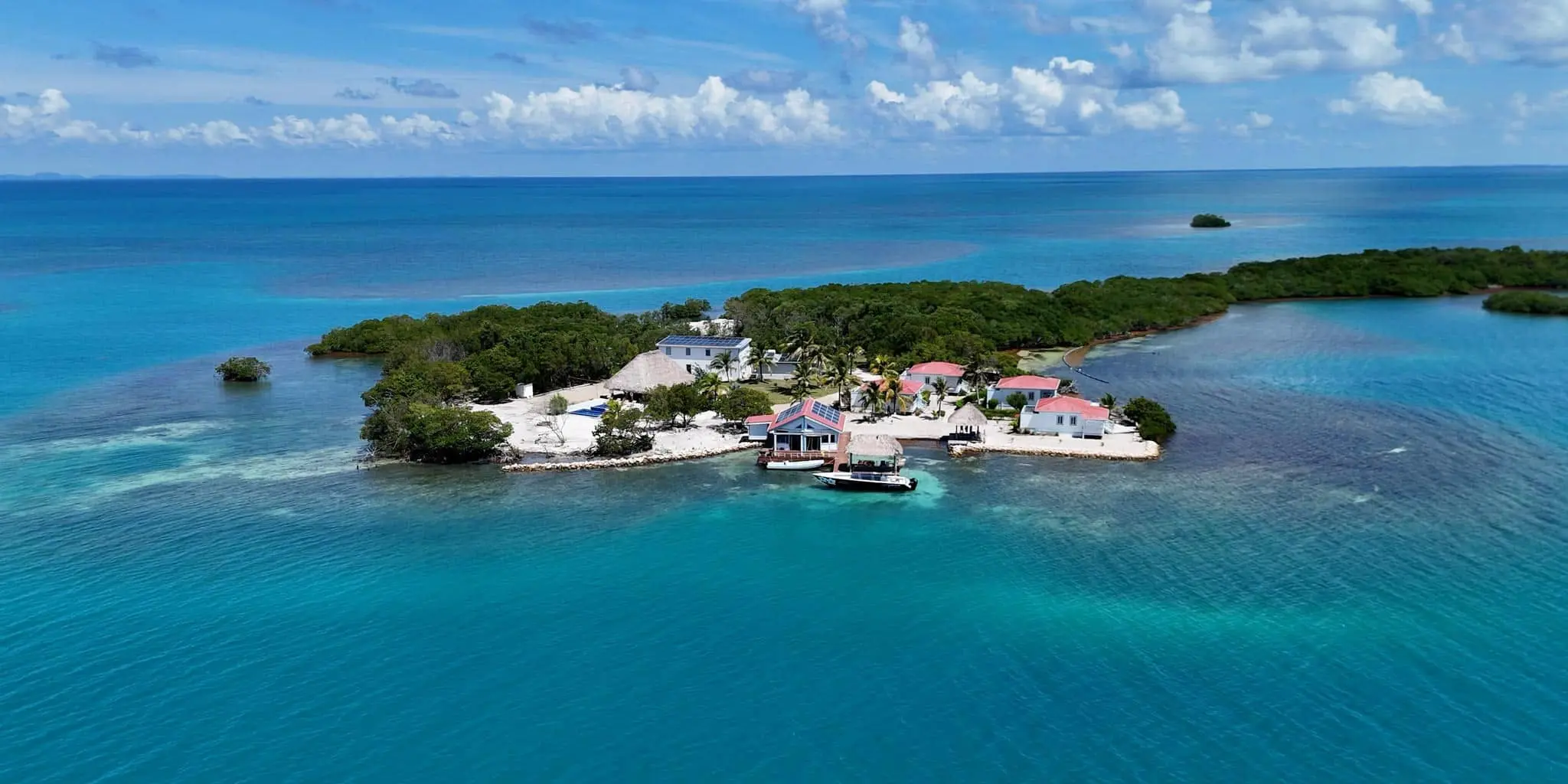 https://claude.ai/chat/32d6eedf-1011-4918-a2a6-568c06a44276#:~:text=Breathtaking%20overhead%20view%20of%20Blue%20Reef%20Island%20nestled%20in%20crystal%20clear%20Caribbean%20waters%20close%20to%20the%20world%27s%20second%20largest%20barrier%20reef%2C%20off%20Dangriga%2C%20Southern%20Belize